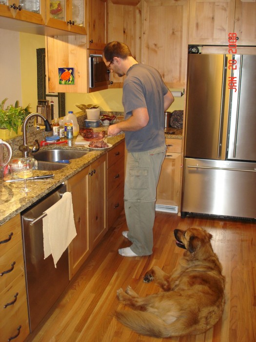 Jason cooked with the help of the granddogs.