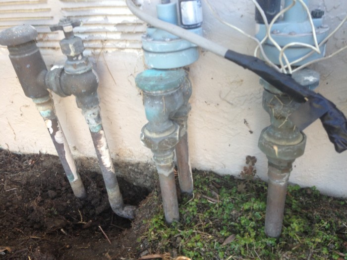 gonna have a go at converting this left valve to an electronic one wired into the sprinkler system.  I was going to cut off the old copper pipes, sweat on some threaded connectors to attach the PVC.  It will be my first go at joining copper pipe!